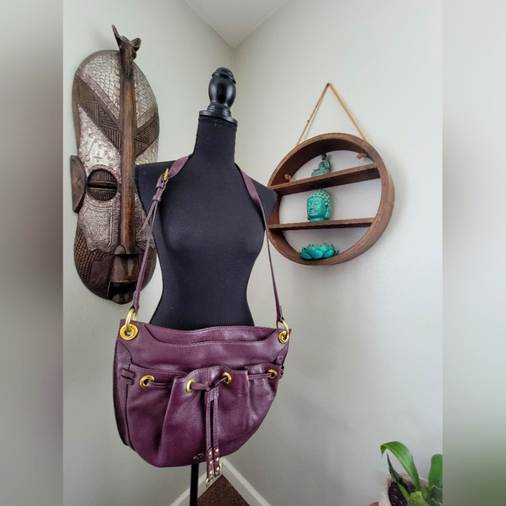 orYANY Purple Leather Drawstring Crossbody Bag with Gold Hardware